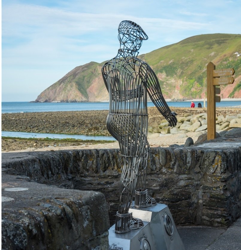 LL27. The walker in Lynmouth, Jon Cool, June 2017